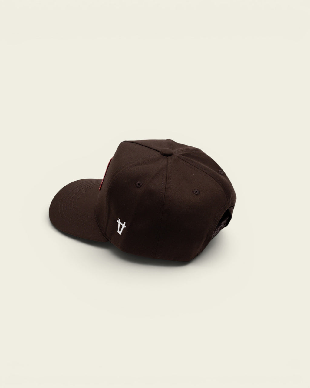 Ayredale Ranch & Co dark brown baseball cap with a red front patch and white side logo embroidery