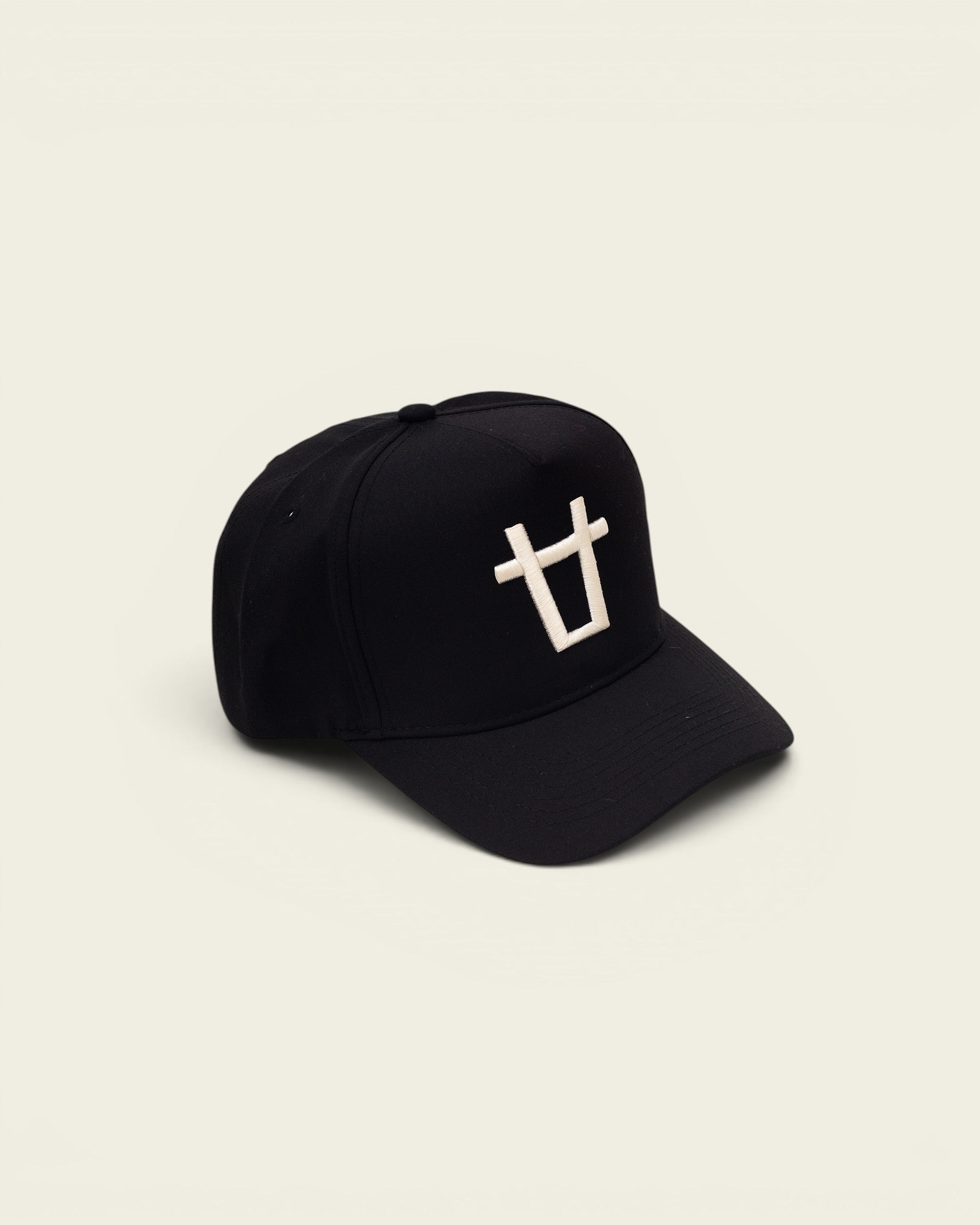 Ayredale Ranch & Co black baseball cap with embroidered white bull logo on the front.