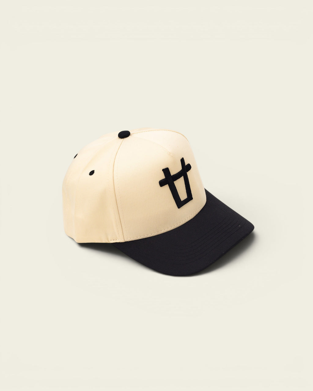Ayredale Ranch & Co. beige baseball cap with black brim and black bull logo