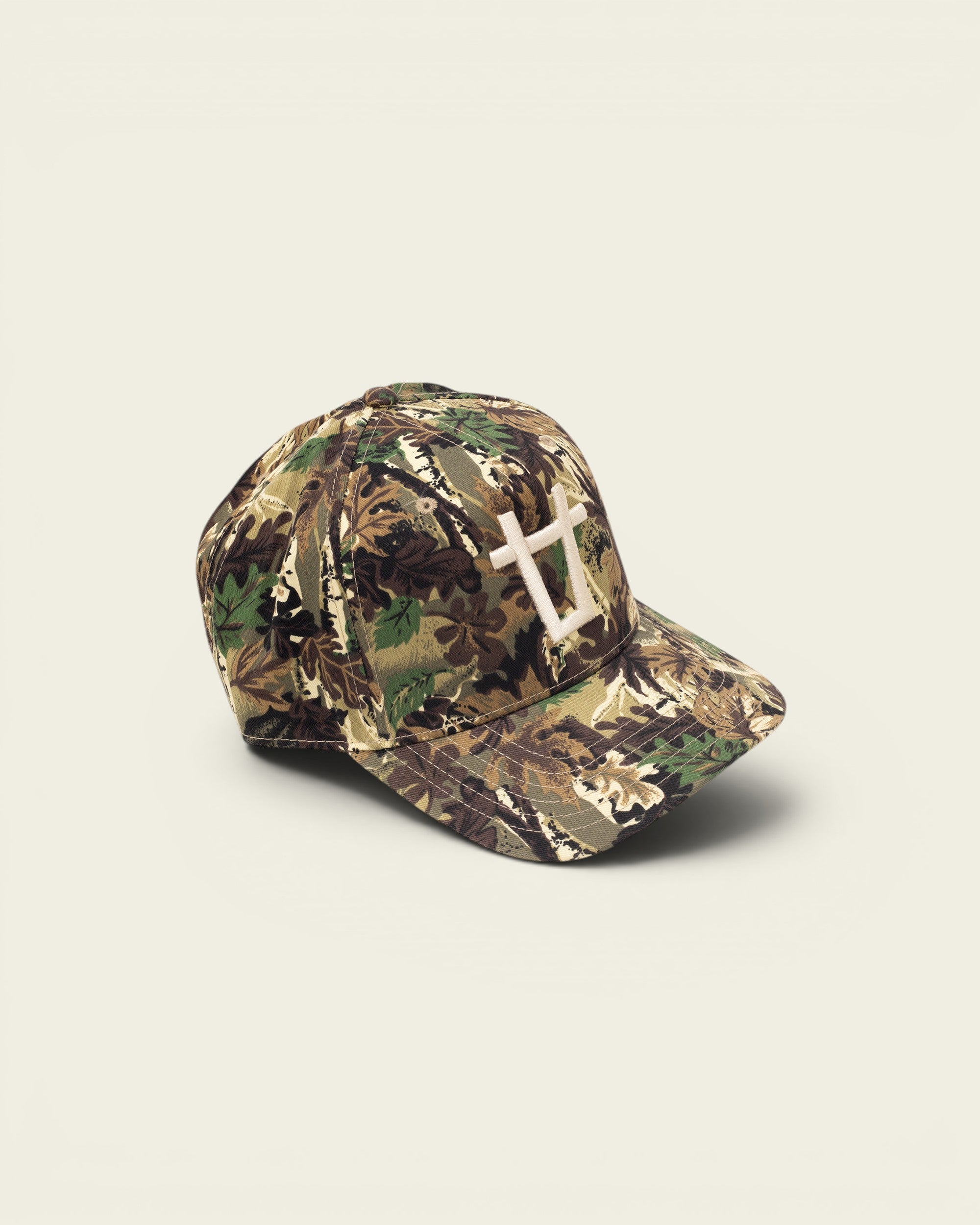 Ayredale Ranch & Co camouflage baseball cap with white bull logo embroidery. Features a classic curved brim and adjustable strap.
