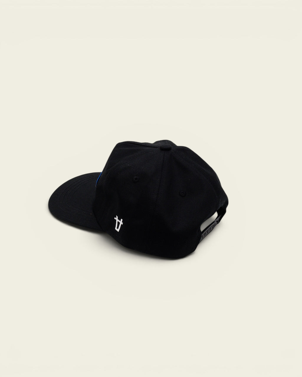 Ayredale Ranch & Co black snapback cap with a blue patch and white side logo embroidery on a white background.
