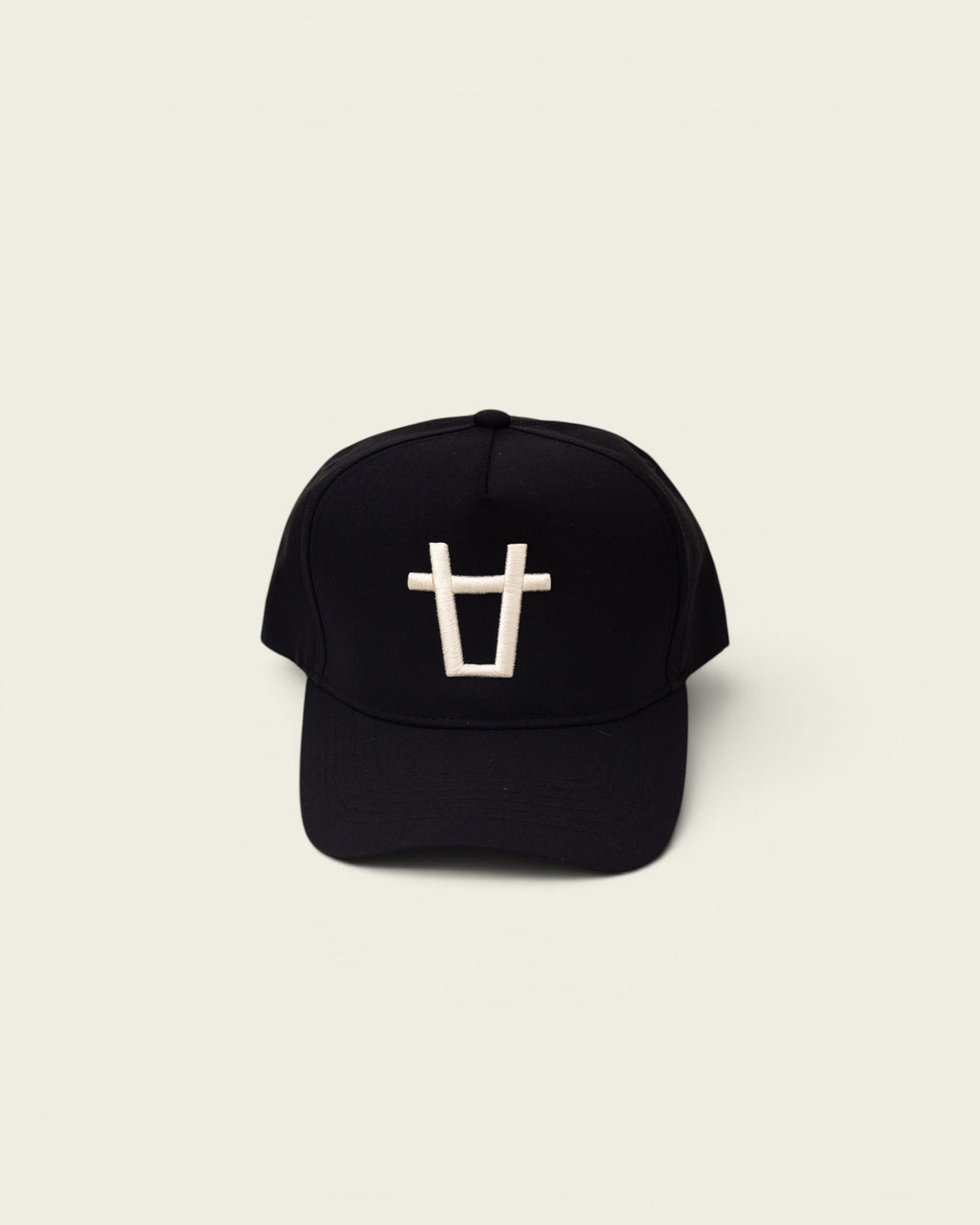 Ayredale Ranch & Co black baseball cap with white bull logo embroidery on the front.