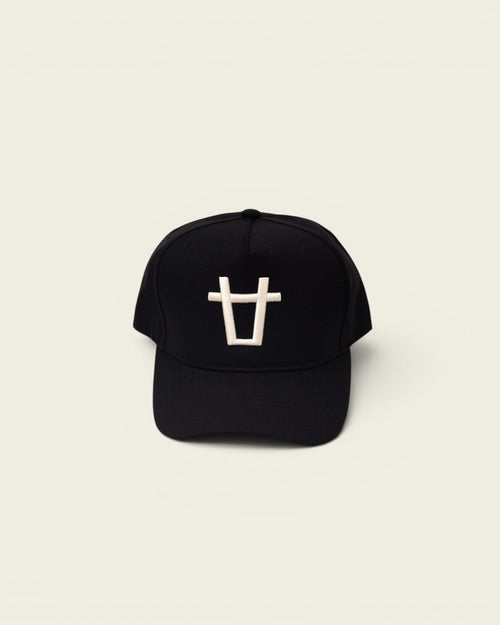 Ayredale Ranch & Co black baseball cap with white bull logo embroidery on the front.