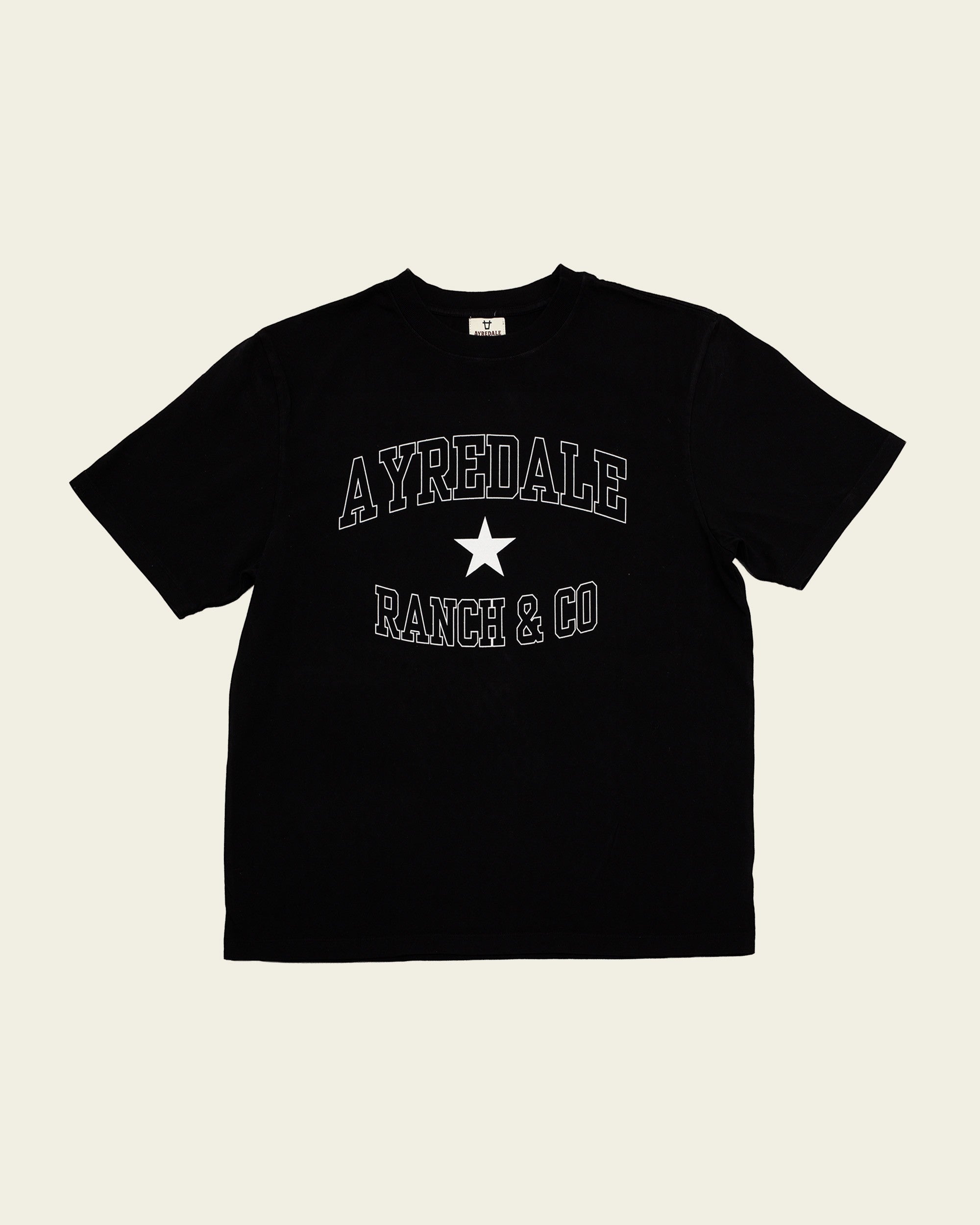 Ayredale Ranch & Co black short-sleeve t-shirt with white collegiate-style text and a star graphic on the chest.