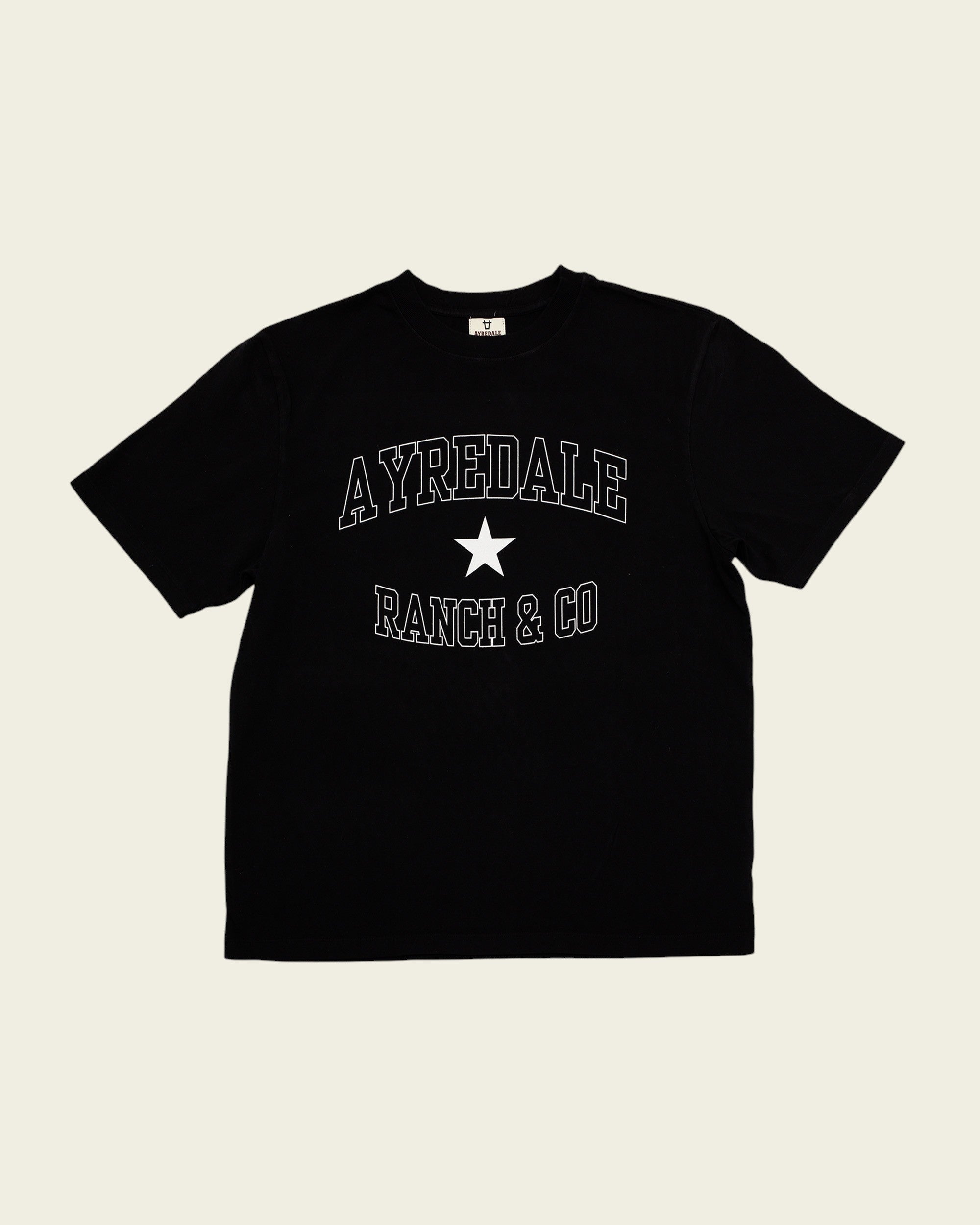 Ayredale Ranch & Co black short-sleeve t-shirt with white collegiate-style text and a star graphic on the chest.