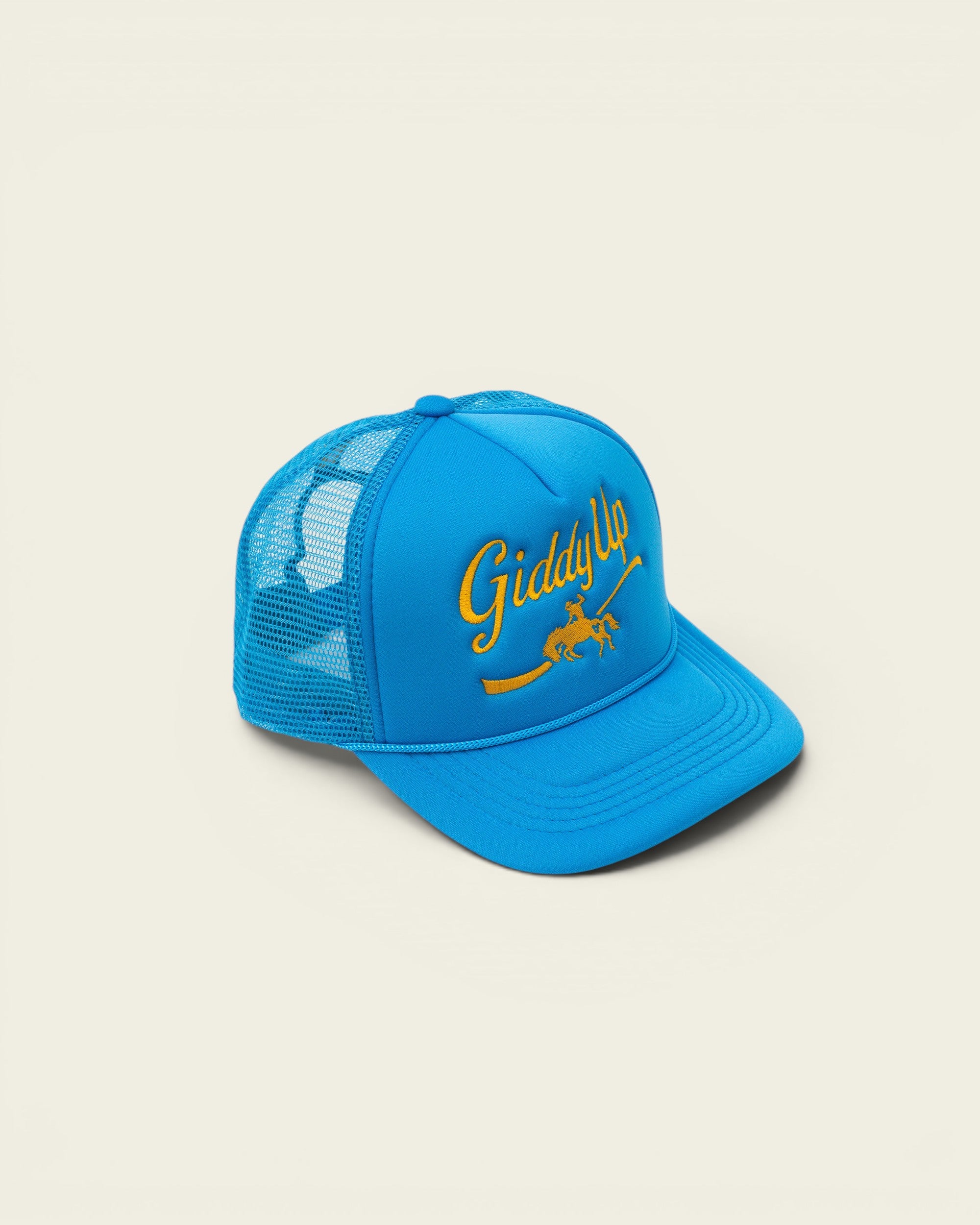 Ayredale Ranch & Co blue trucker hat with yellow 'Giddy Up' embroidery and horse graphic.