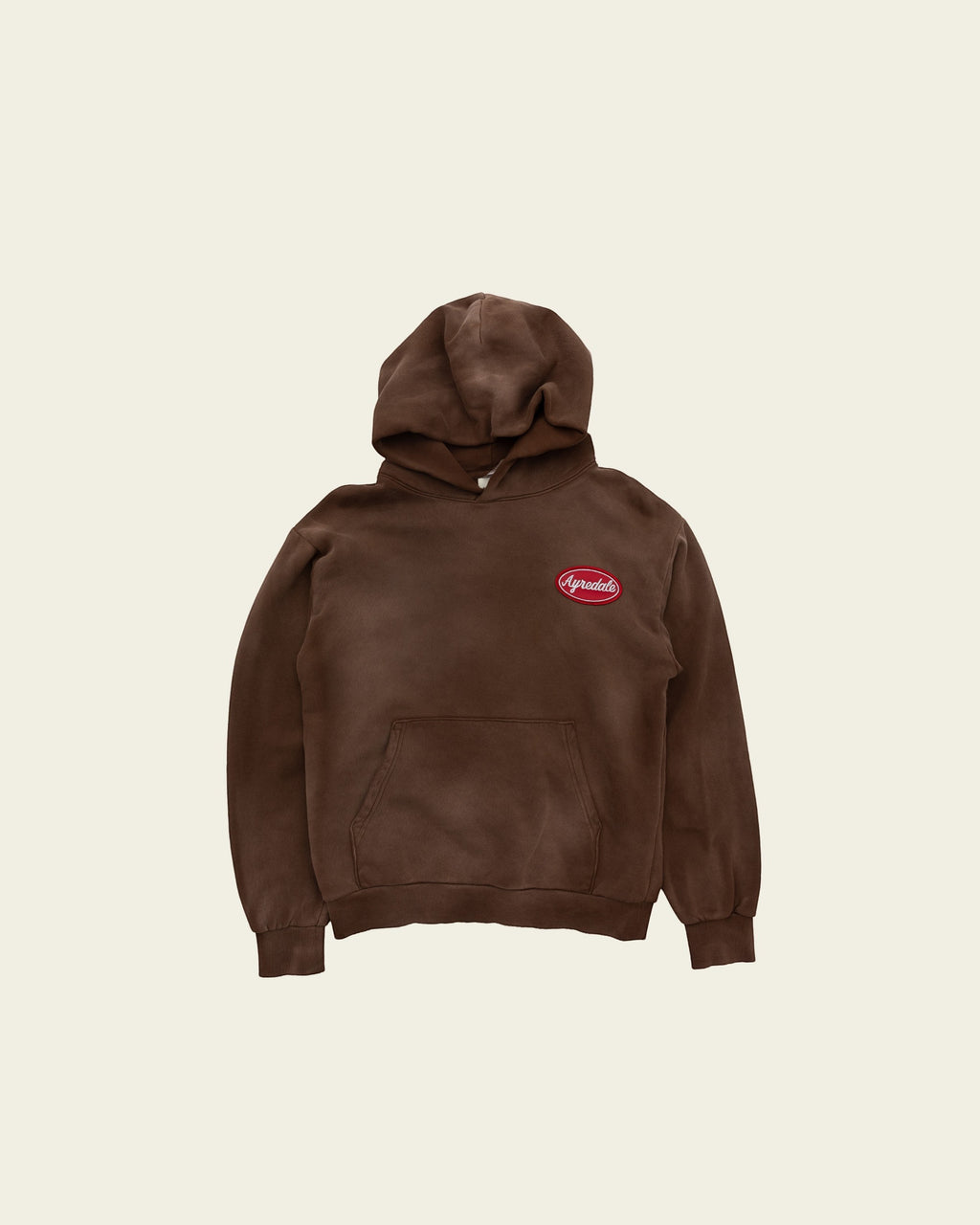 Ayredale Ranch & Co brown Motor Hoodie with a red oval logo patch on the chest and a front kangaroo pocket.