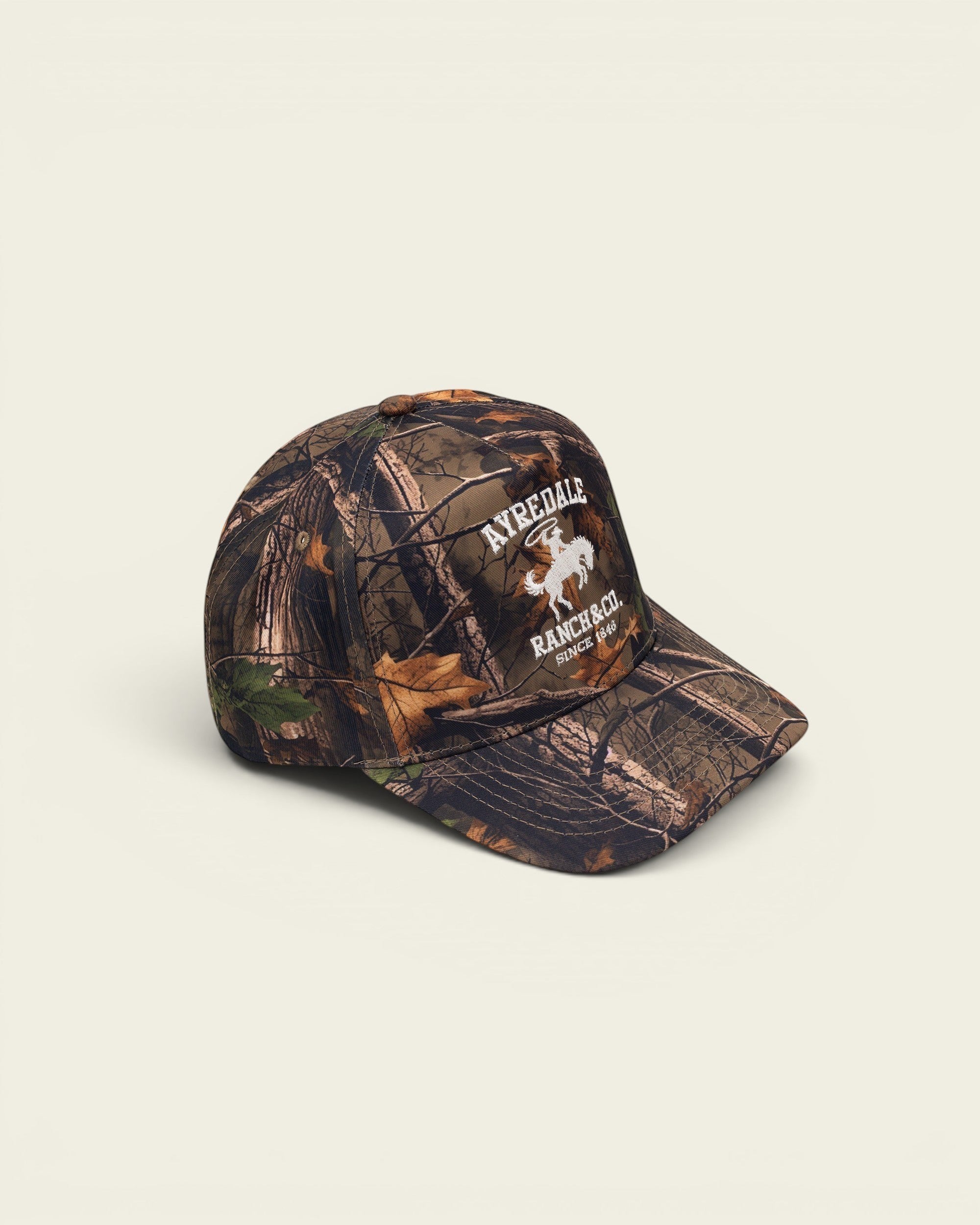 Ayredale Ranch & Co. camouflage baseball cap with embroidered logo and text.