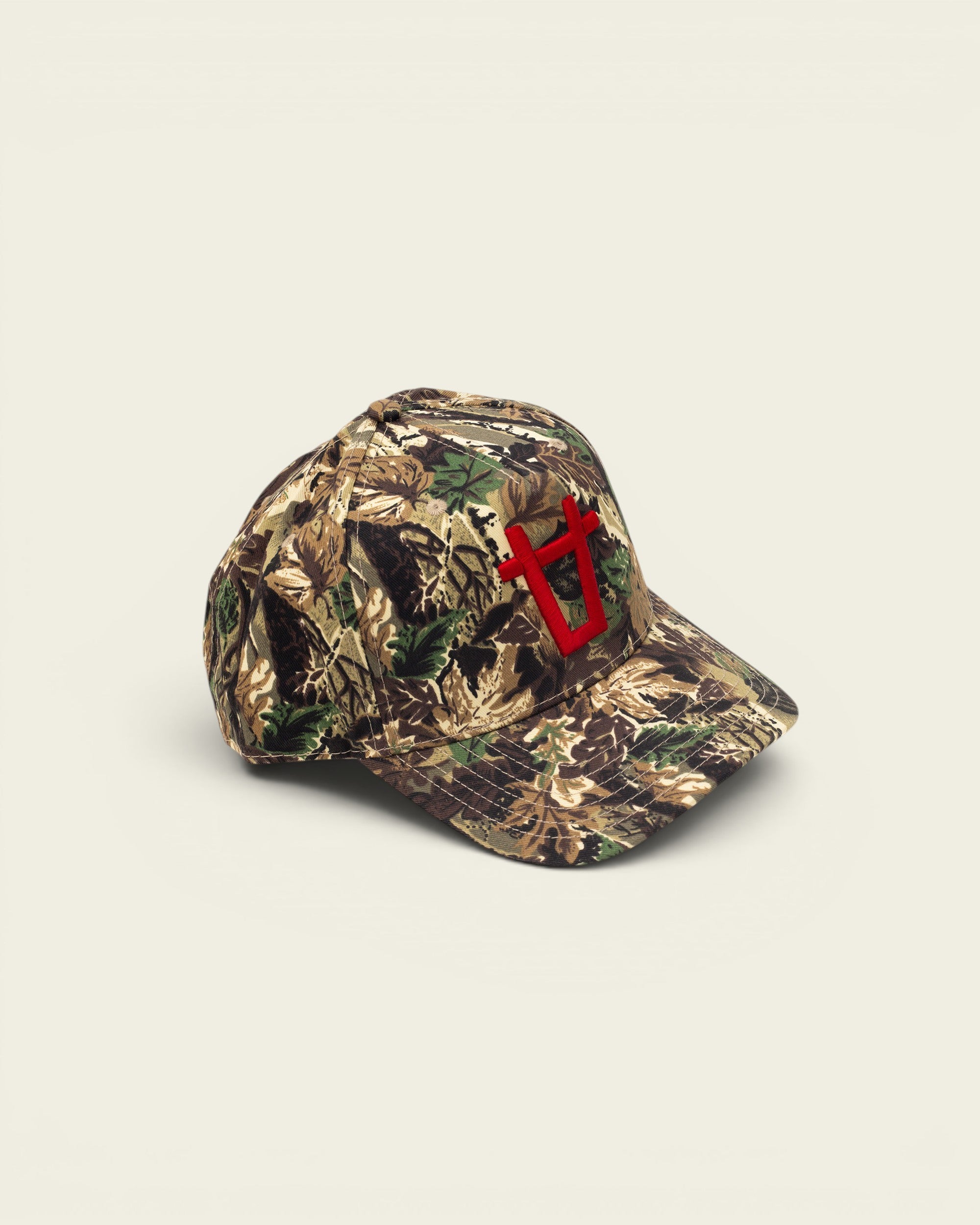 Ayredale Ranch & Co camouflage baseball cap with red embroidered logo on front.