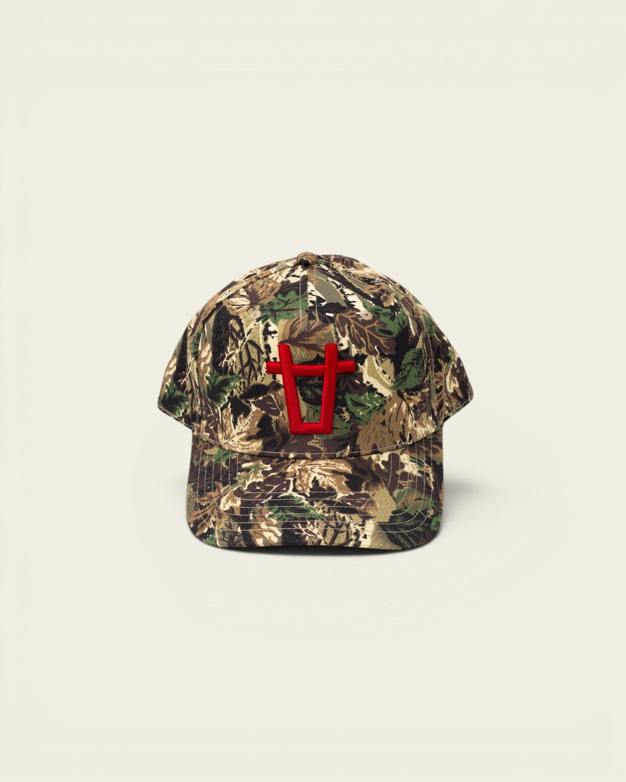 Ayredale Ranch & Co camouflage baseball cap with red embroidered logo on the front.