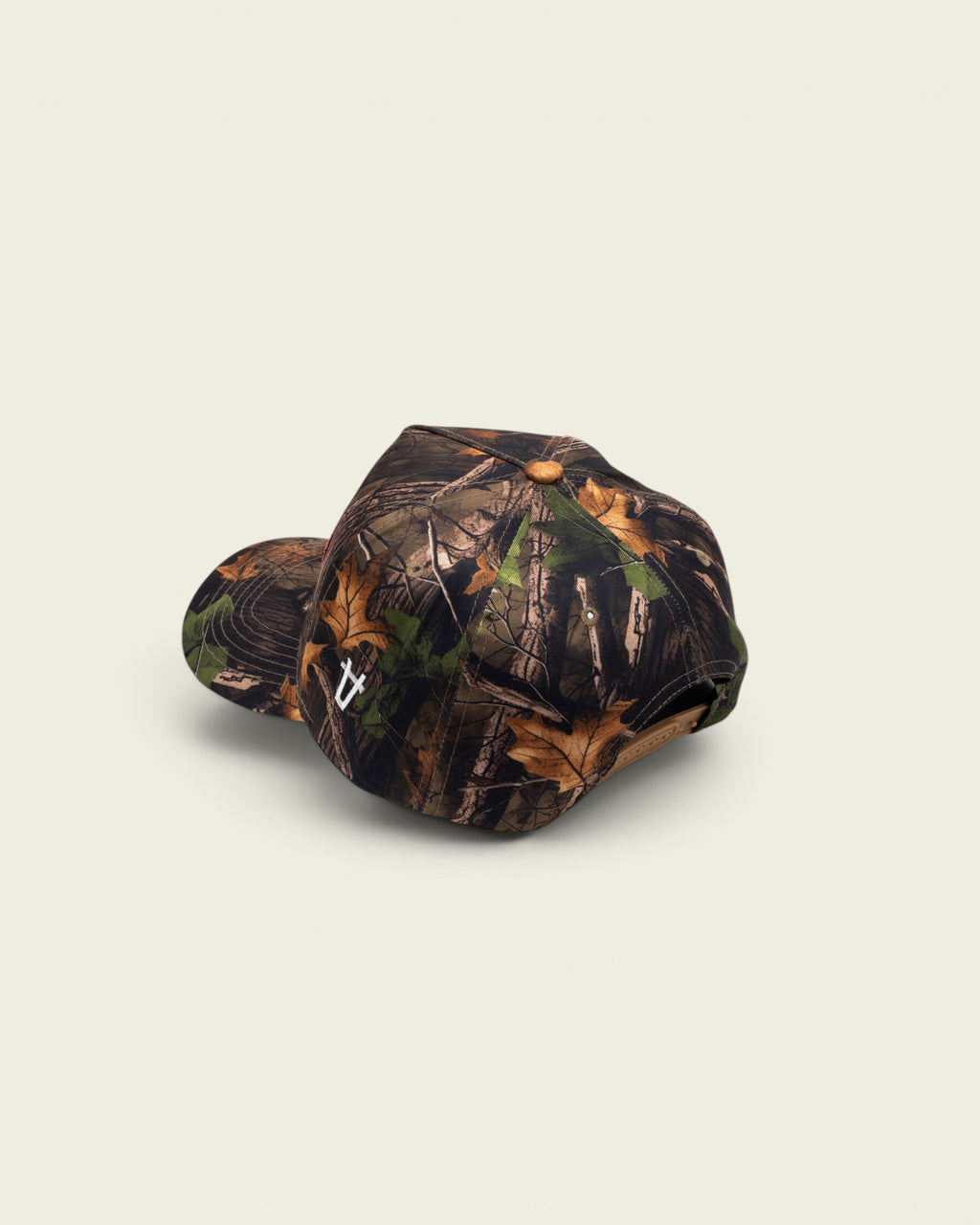 Ayredale Ranch & Co Ranch Camo Red baseball cap featuring a detailed forest leaf camouflage pattern and snapback.
