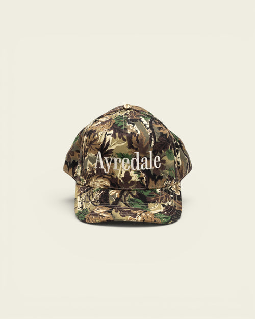 Ayredale Ranch & Co OG structured snapback cap in camouflage cotton twill with white serif wordmark embroidery