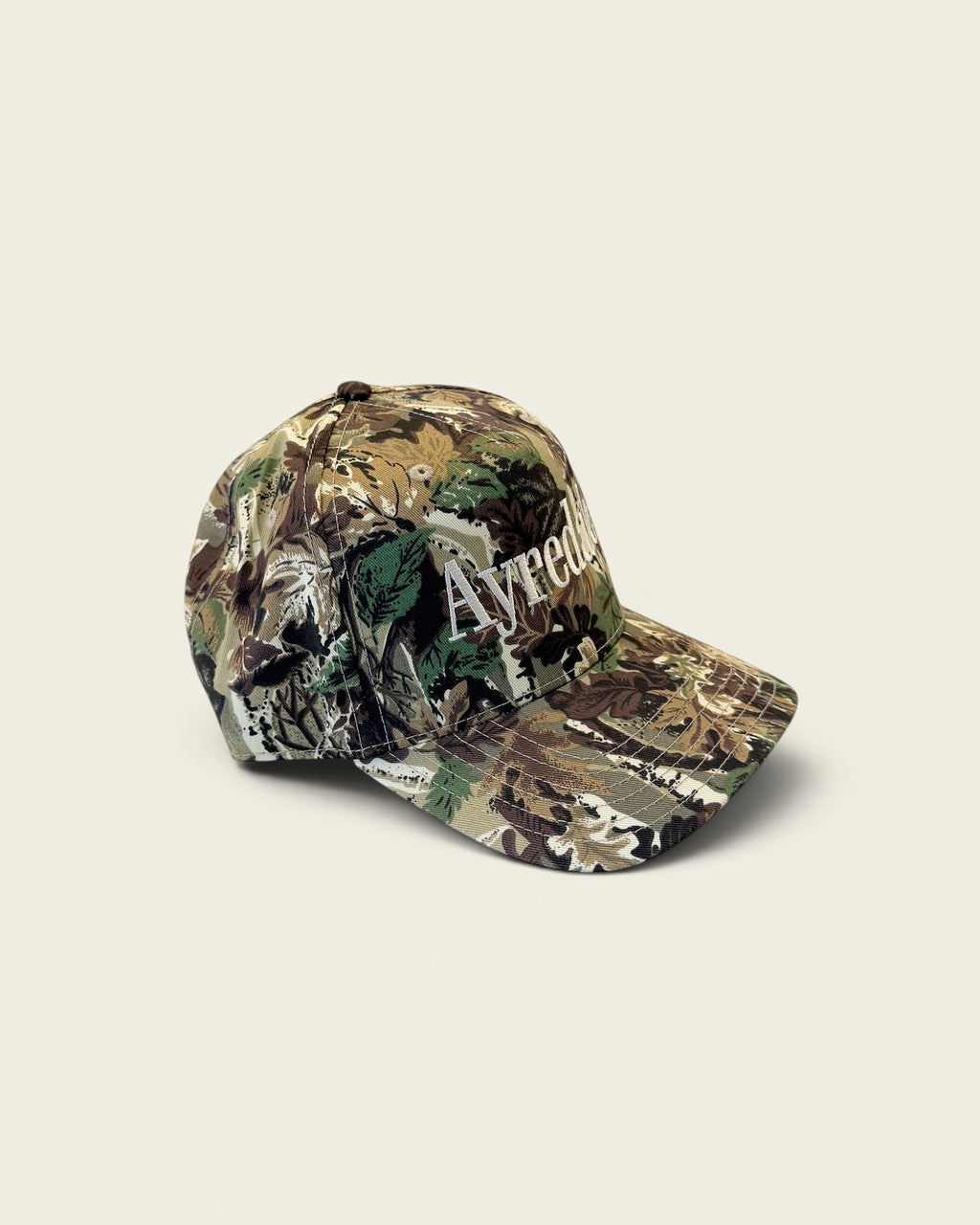 Ayredale Ranch & Co camouflage baseball cap with embroidered Ayredale logo on the front.
