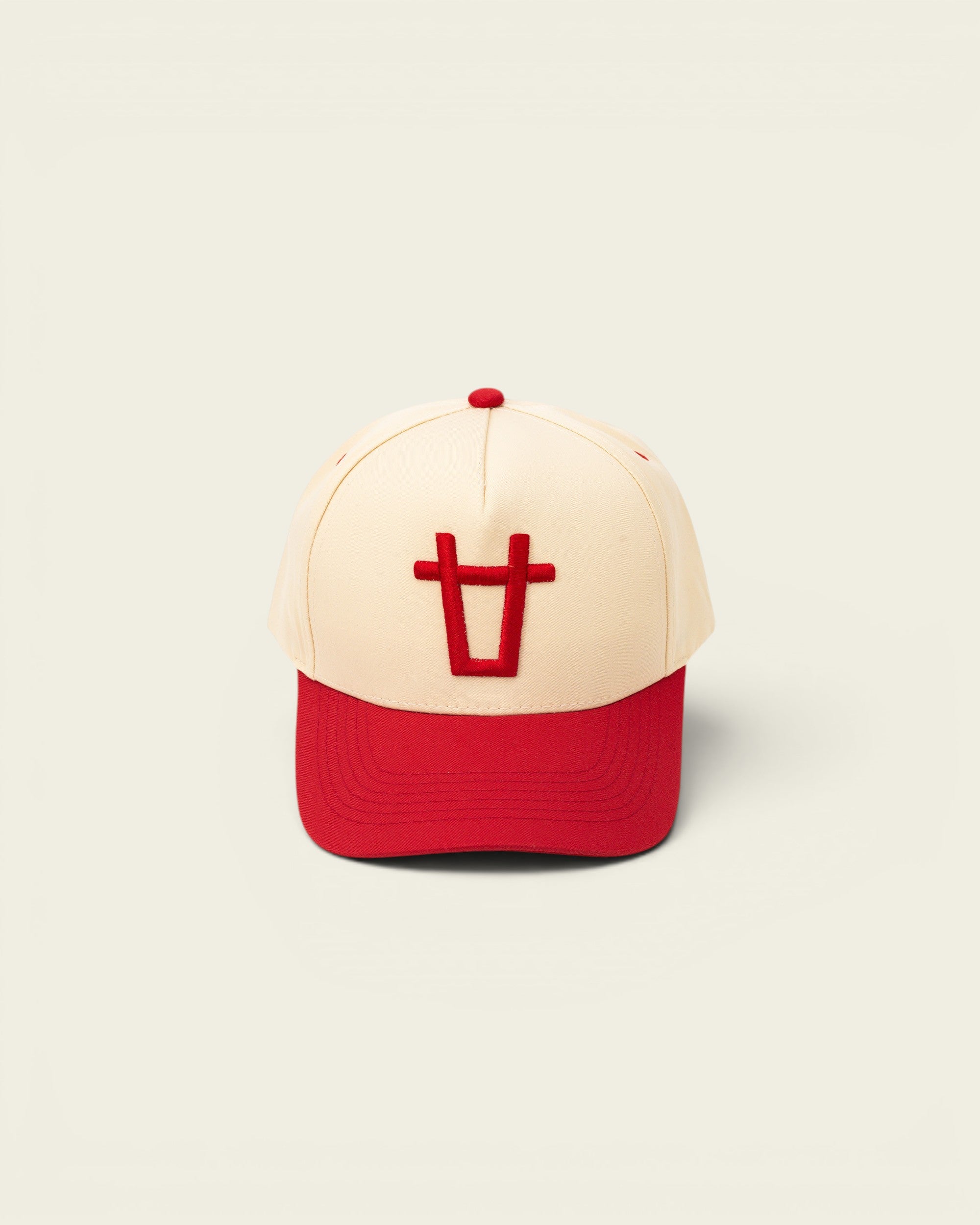 Ayredale Ranch & Co baseball cap in cream with red brim and red embroidered logo.