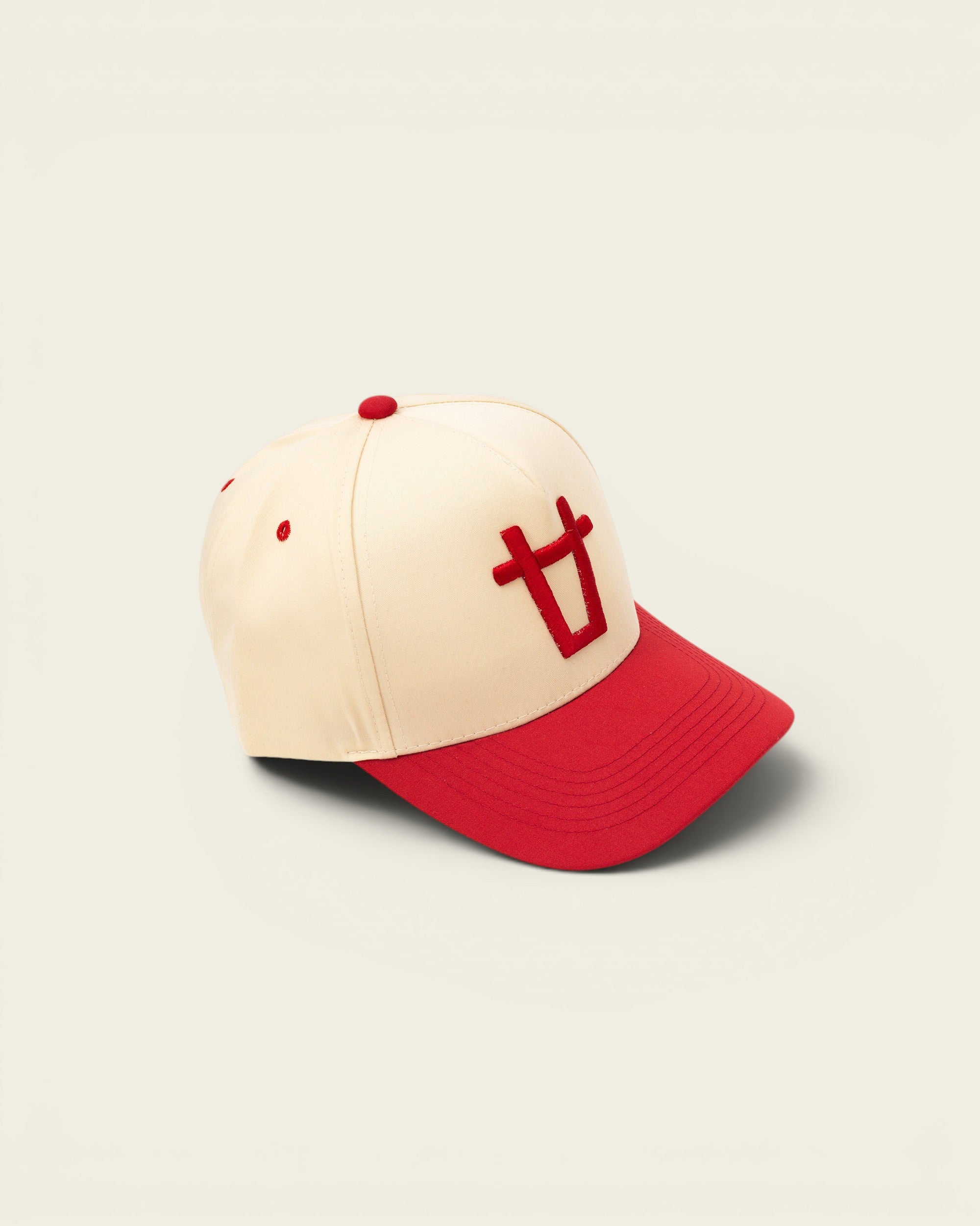 Ayredale Ranch & Co baseball cap in cream with red brim and red embroidered logo.