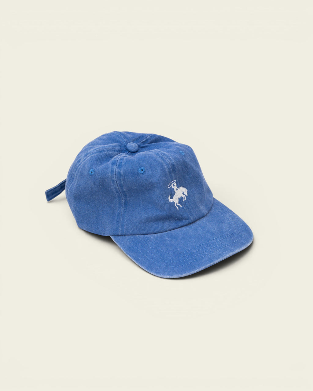 Ayredale Ranch & Co faded blue cotton baseball cap with embroidered cowboy on horse detail.