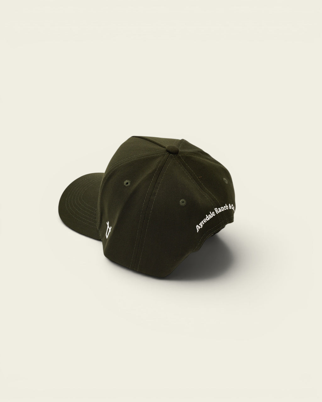 Ayredale Ranch & Co dark green baseball cap with embroidered logo on the side and back.
