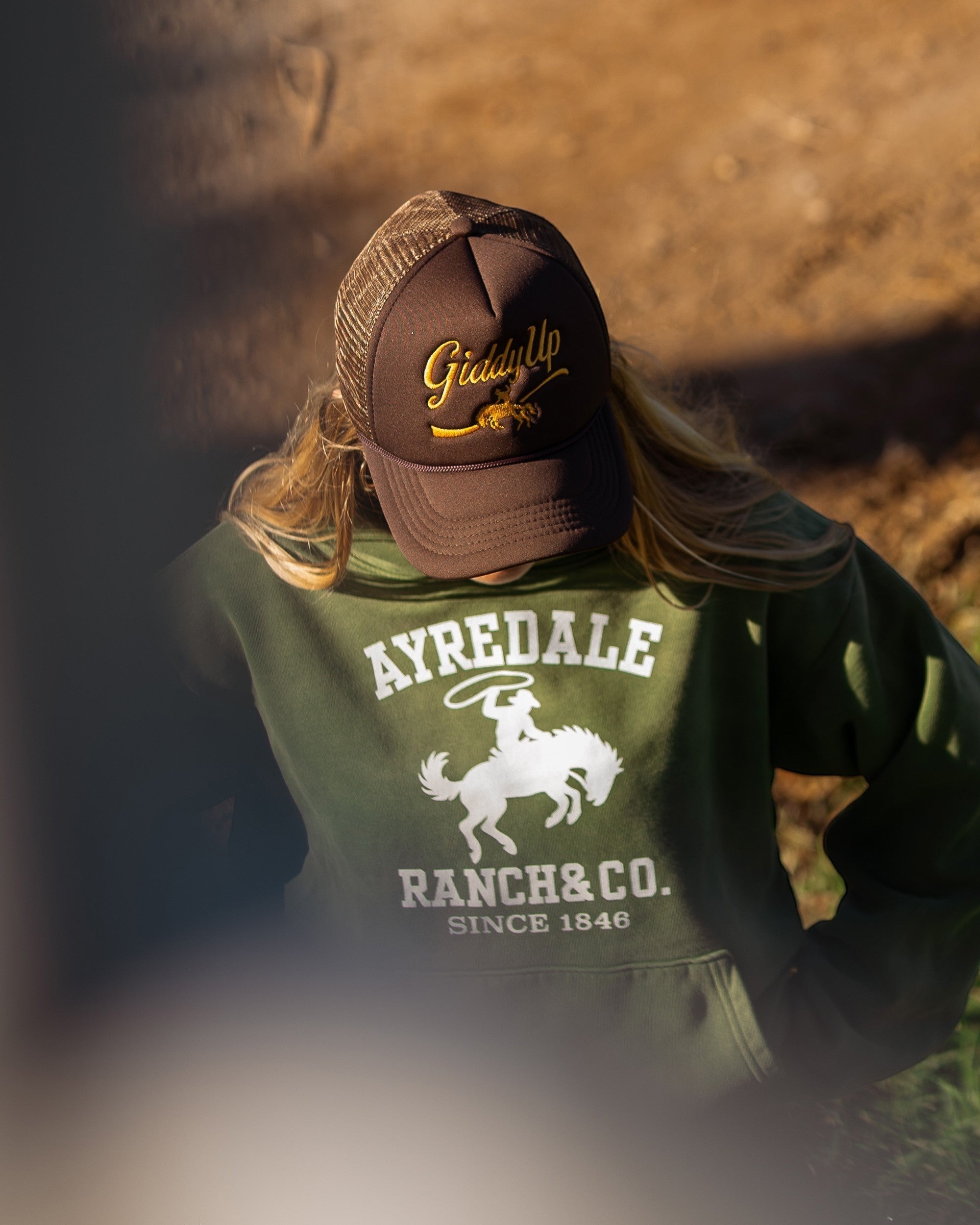 Ayredale Ranch & Co. green heavyweight fleece hoodie with a white collegiate graphic on the back.