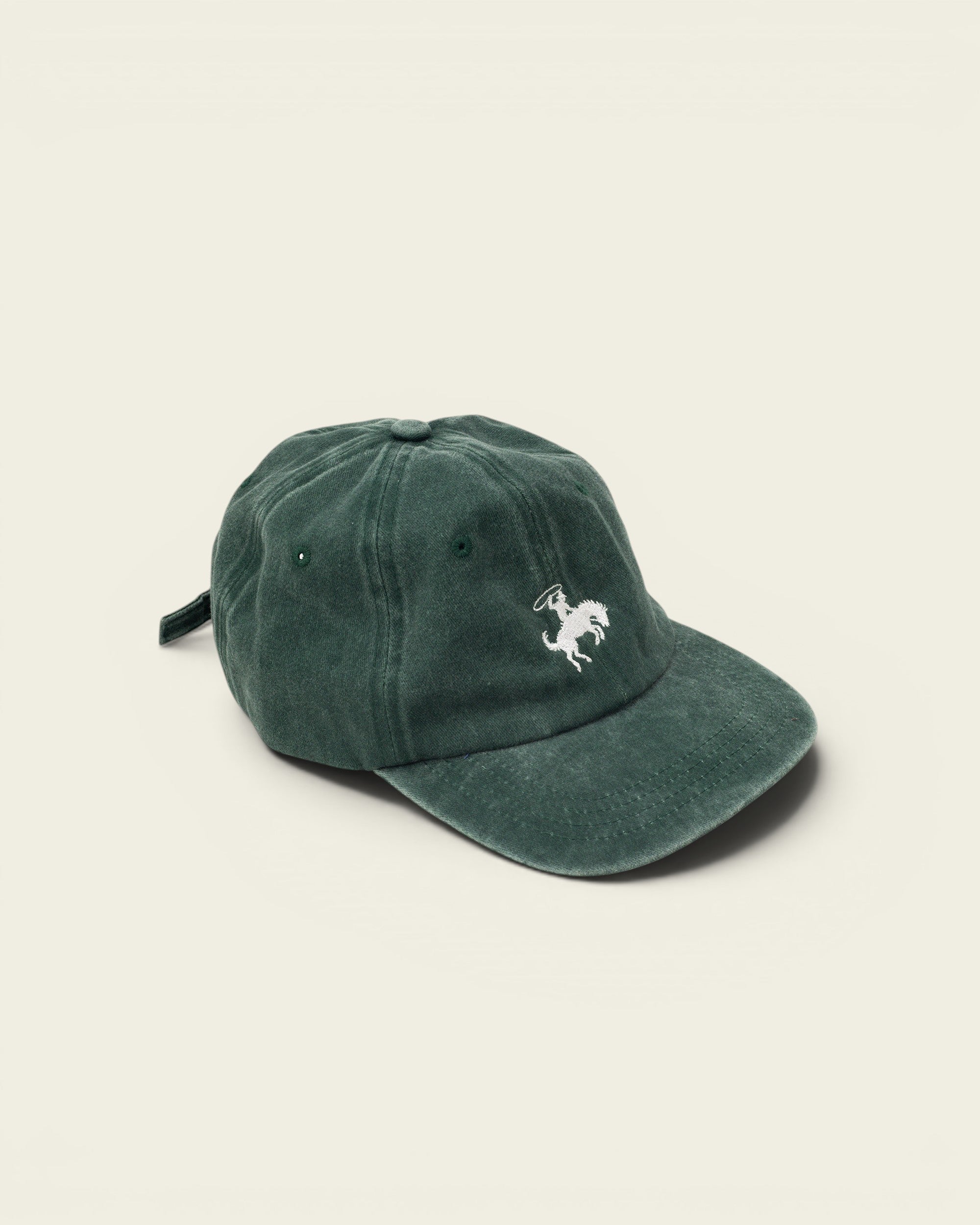 Ayredale Ranch & Co faded green cotton baseball cap with embroidered white rodeo rider detail.