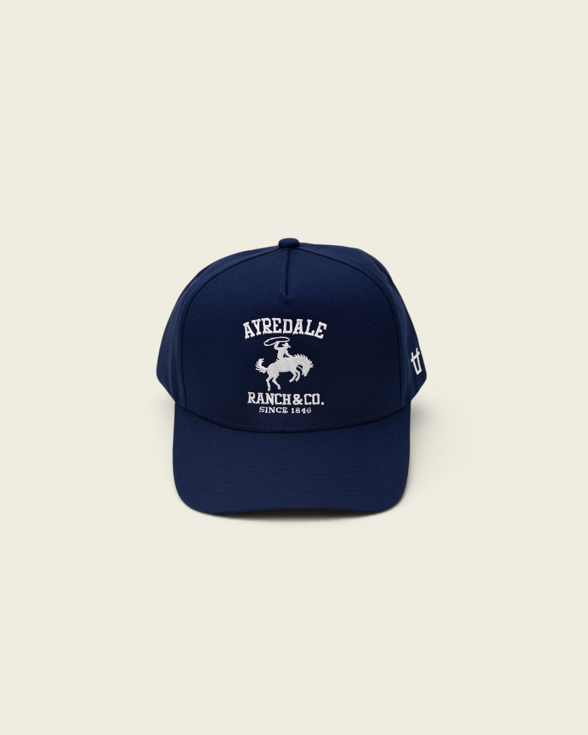 Ayredale Ranch & Co navy blue baseball cap with embroidered logo and white text.