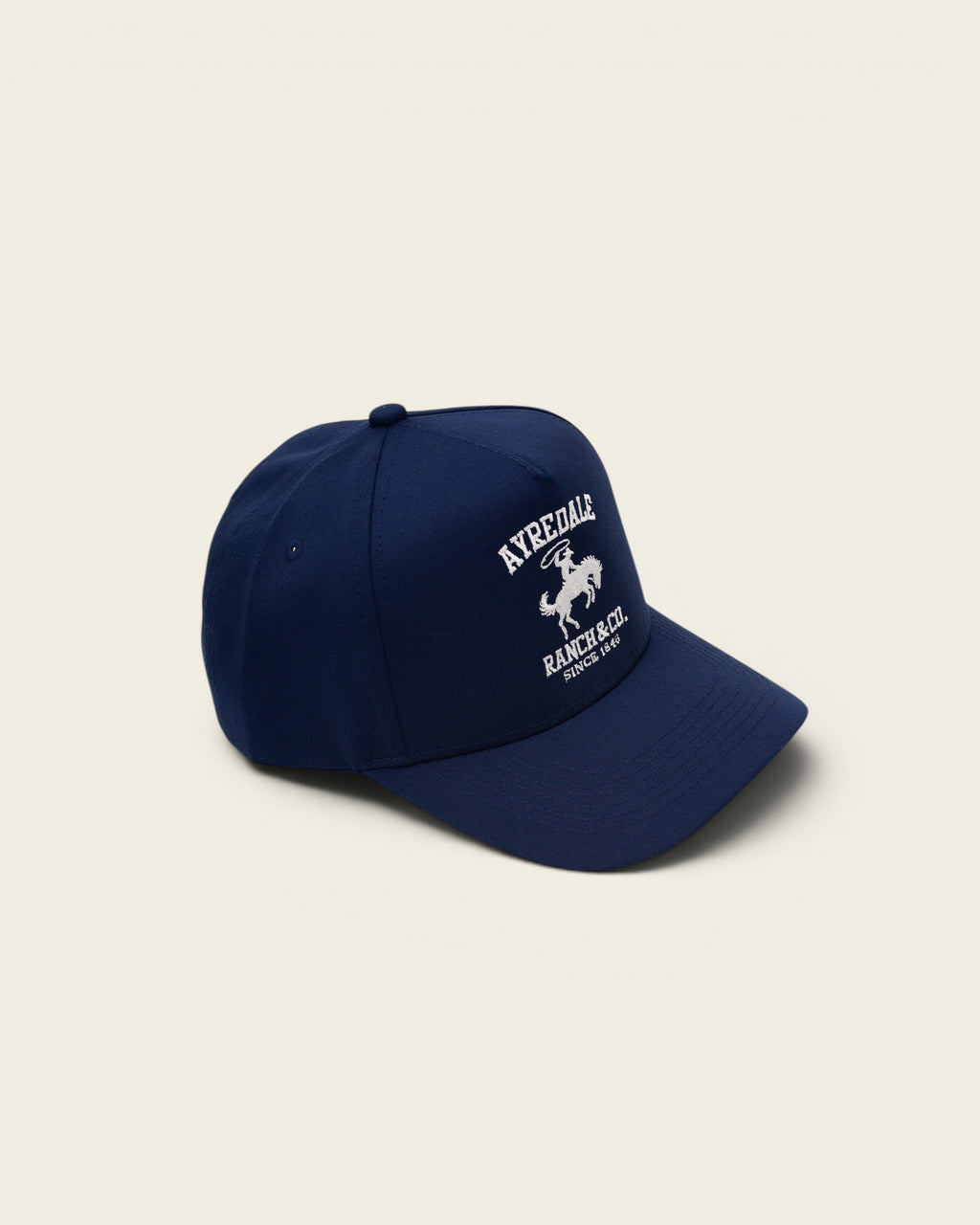 Ayredale Ranch & Co navy blue baseball cap with embroidered logo and white text.