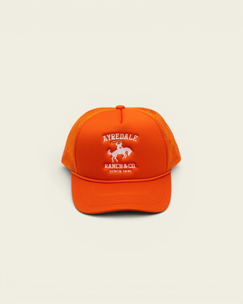 Ayredale Ranch & Co bright orange trucker hat with white embroidered cowboy logo and mesh back panel