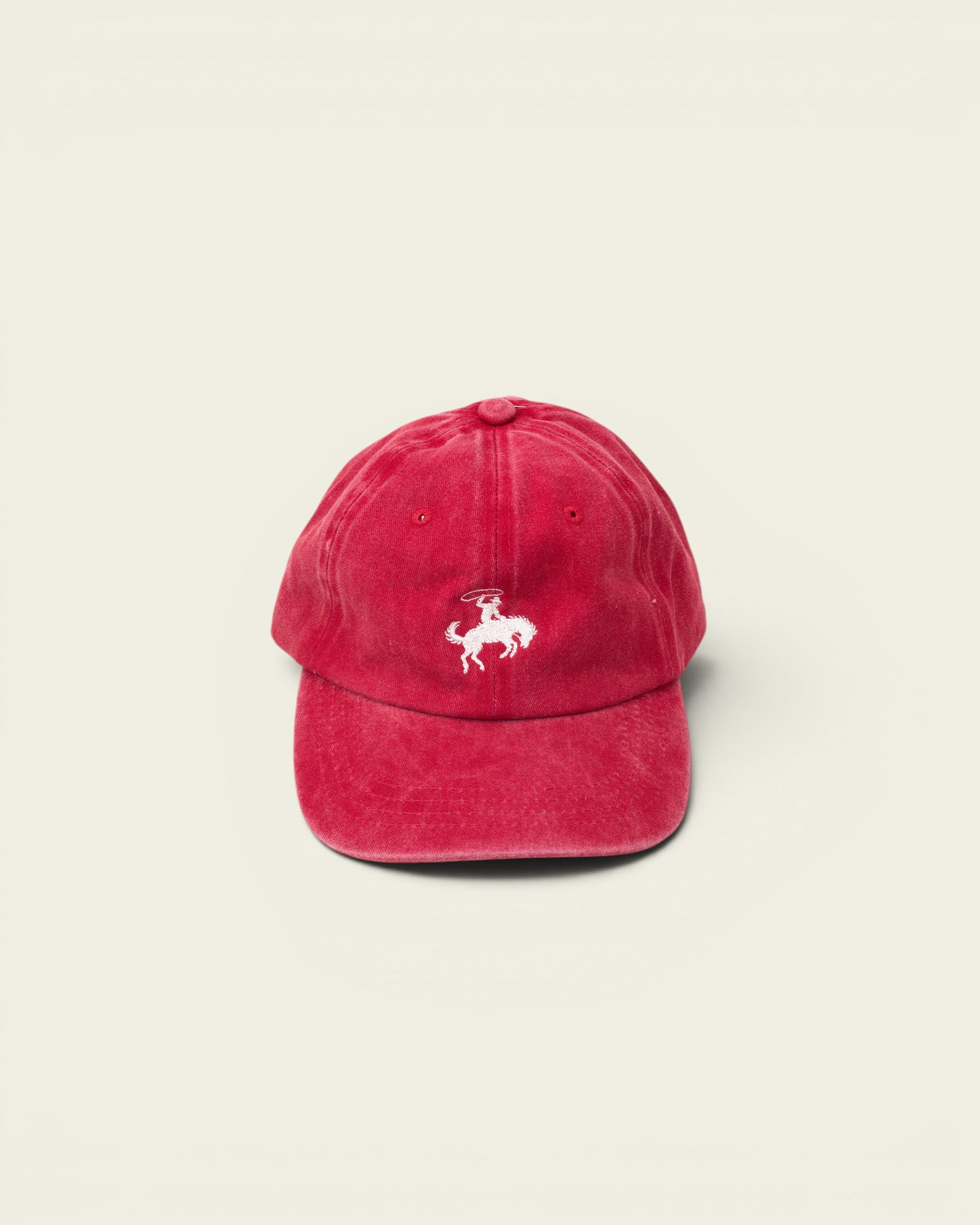 Ayredale Ranch & Co faded red cotton baseball cap with white embroidered cowboy on a horse.