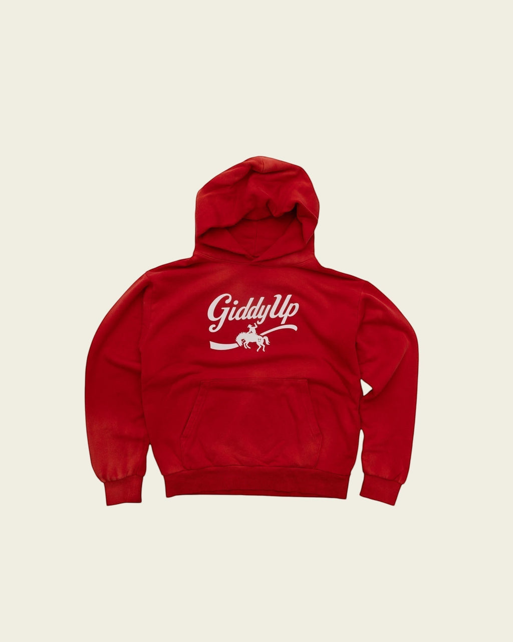 Ayredale Ranch & Co red heavyweight fleece hoodie with a white Giddy Up chest graphic, kangaroo pocket, and ribbed trim