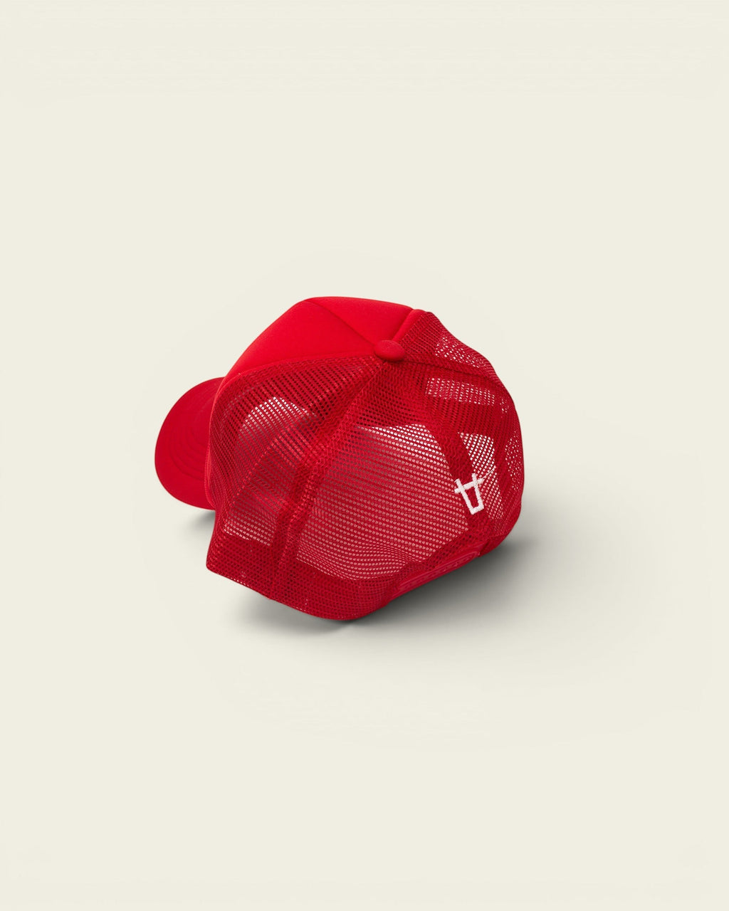 Ayredale Ranch & Co red mesh trucker hat with embroidered logo on back panel.