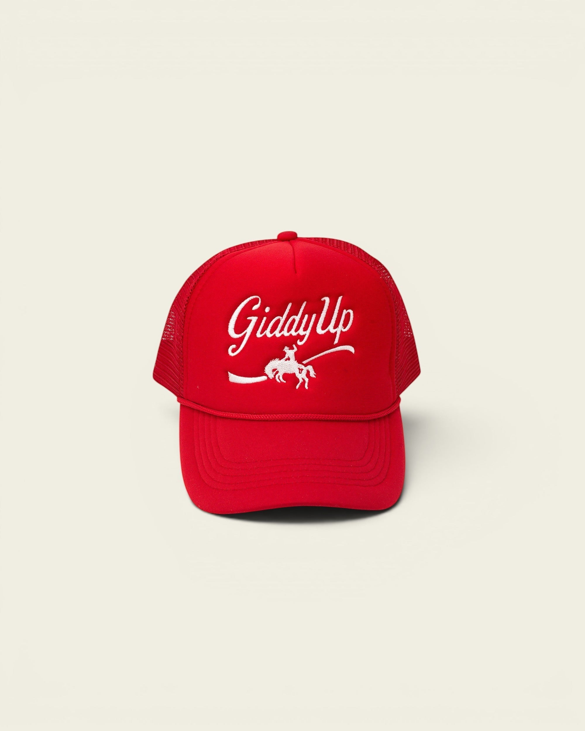 Ayredale Ranch & Co red trucker hat with white "Giddy Up" embroidery and horse graphic.