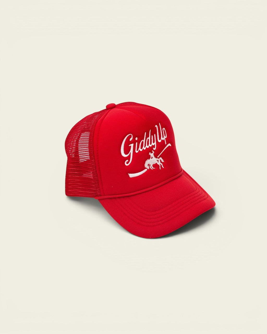 Ayredale Ranch & Co red trucker hat with white "Giddy Up" embroidery and horse graphic.
