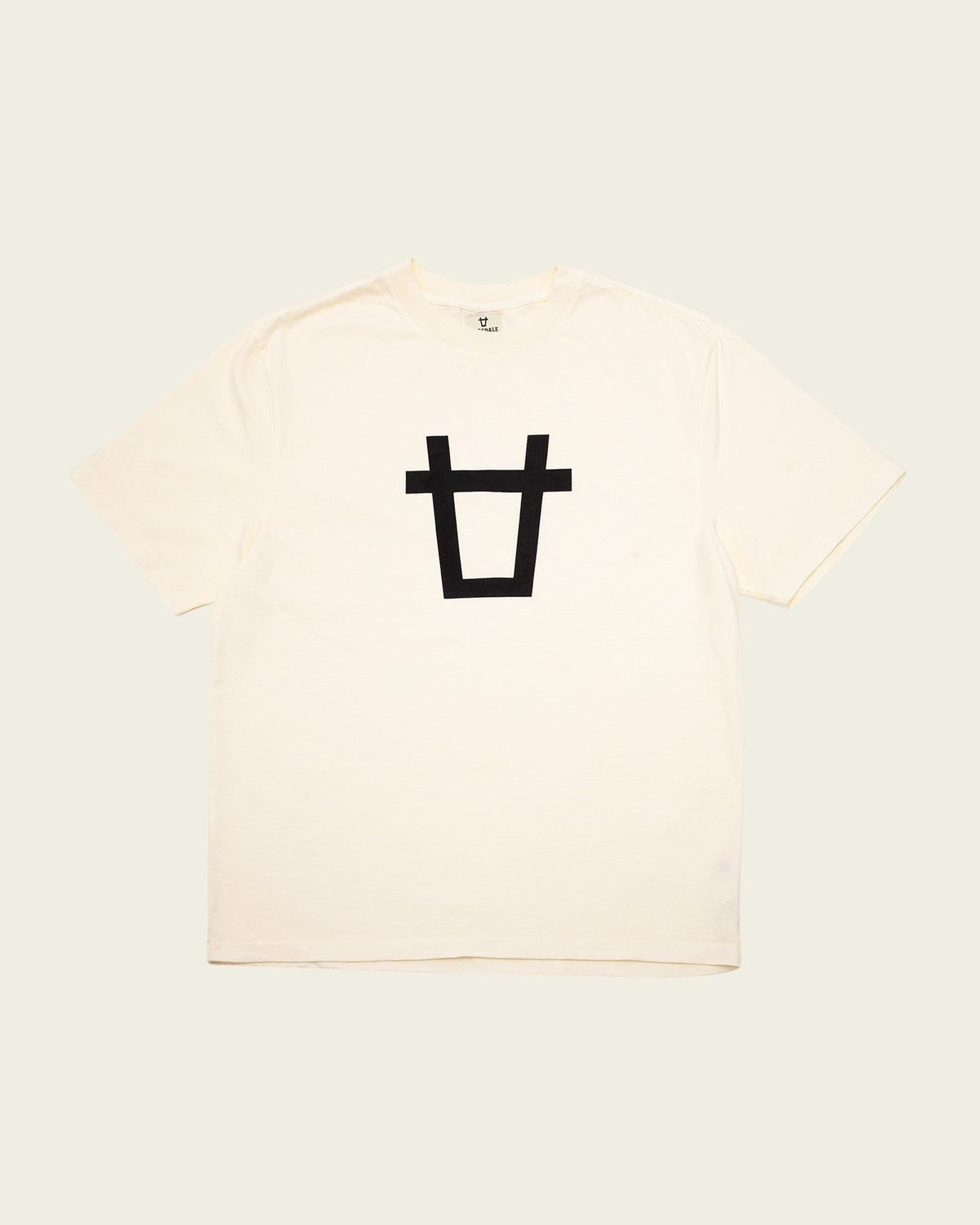 Ayredale Ranch & Co white cotton t-shirt featuring a minimalist black bull head graphic on the chest.