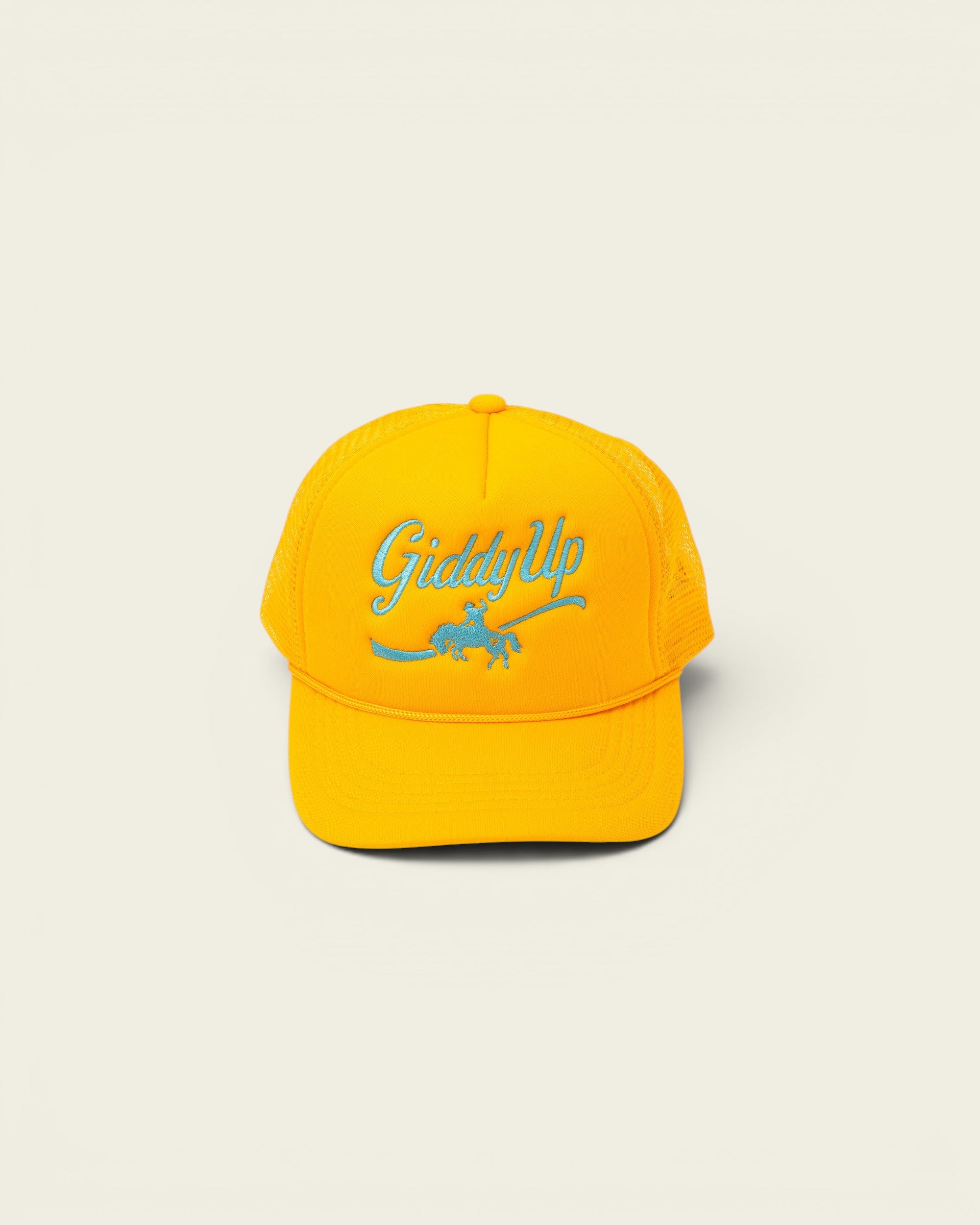 Ayredale Ranch & Co yellow trucker hat with turquoise 'Giddy Up' embroidery and horse graphic.