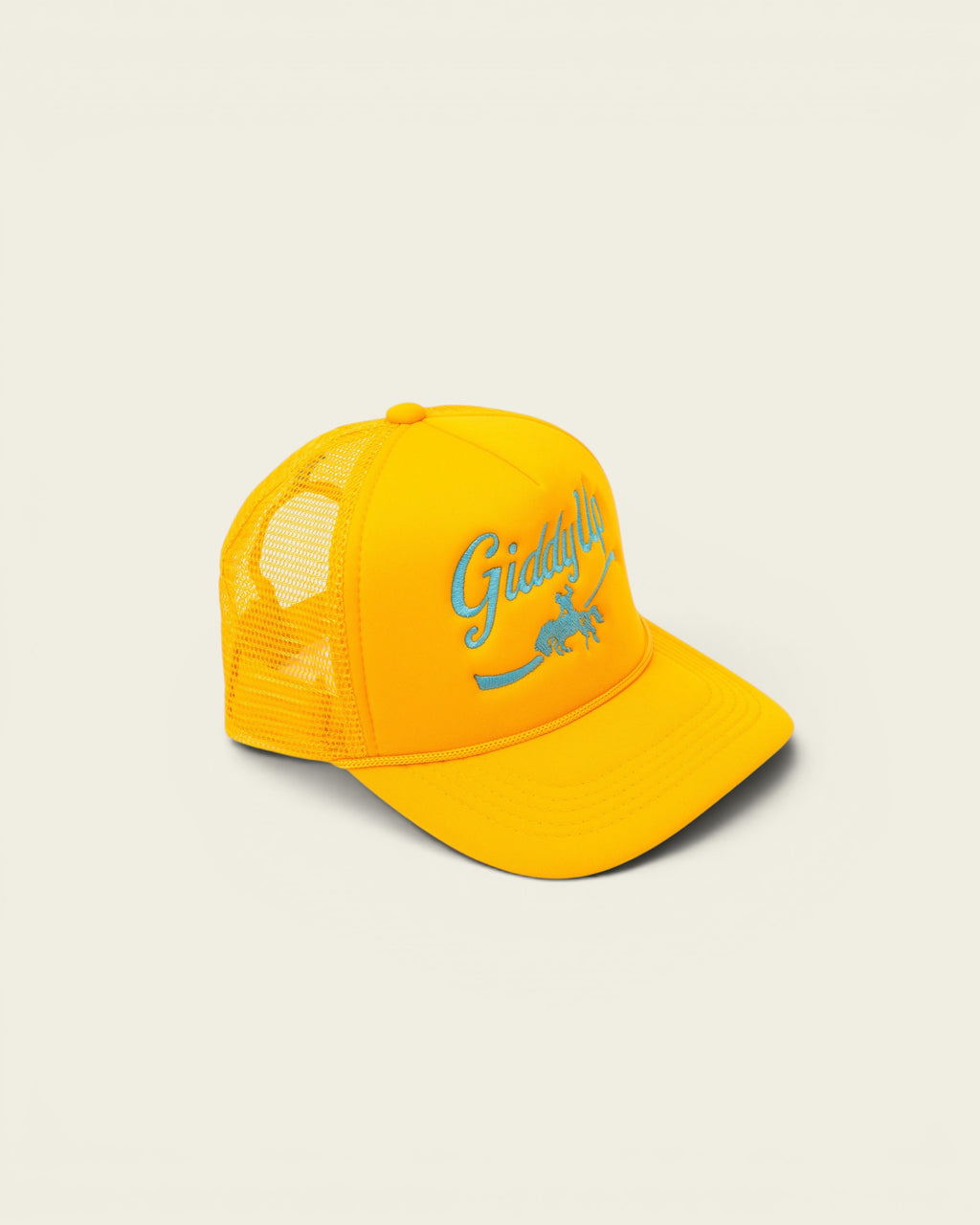 Ayredale Ranch & Co yellow trucker hat with turquoise "Giddy Up" embroidery and a kangaroo graphic.